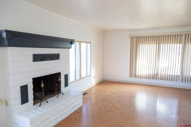 unfurnished living room featuring ornamental molding, a brick fireplace, and parquet floors