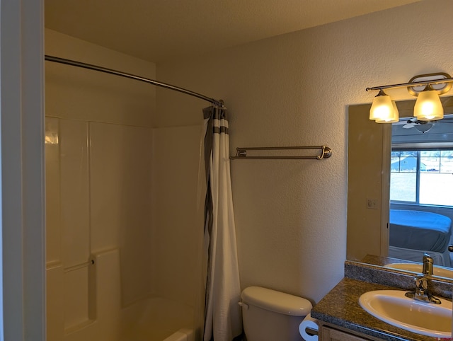 full bathroom with vanity, toilet, and shower / bath combo