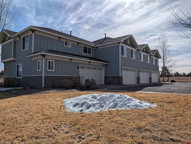 view of property exterior with a garage