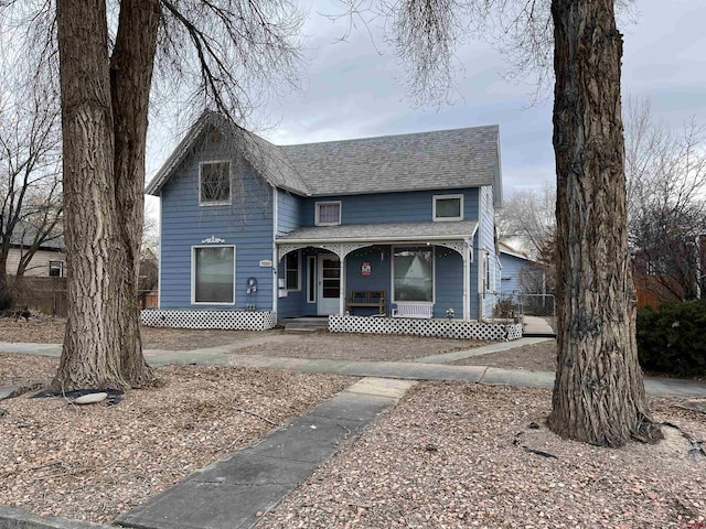 view of front property featuring covered porch