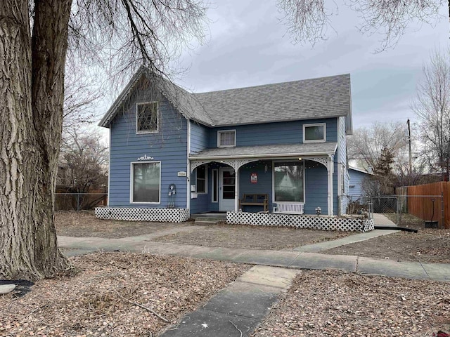 view of property featuring a porch