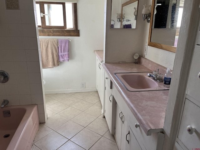 bathroom with tile patterned flooring and vanity