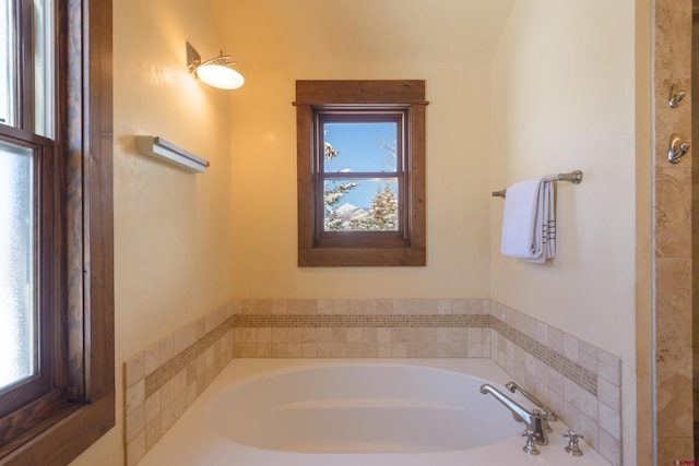 bathroom featuring a tub to relax in