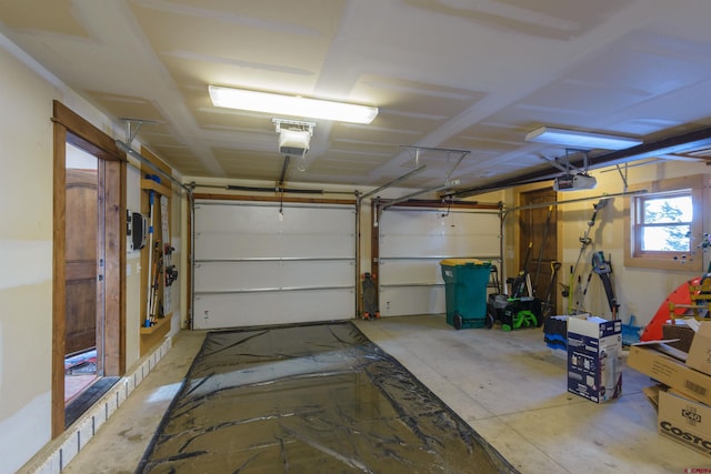 garage featuring a garage door opener