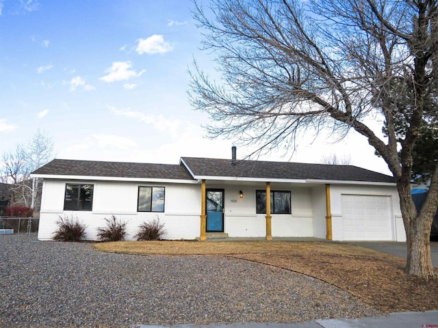 single story home featuring a garage