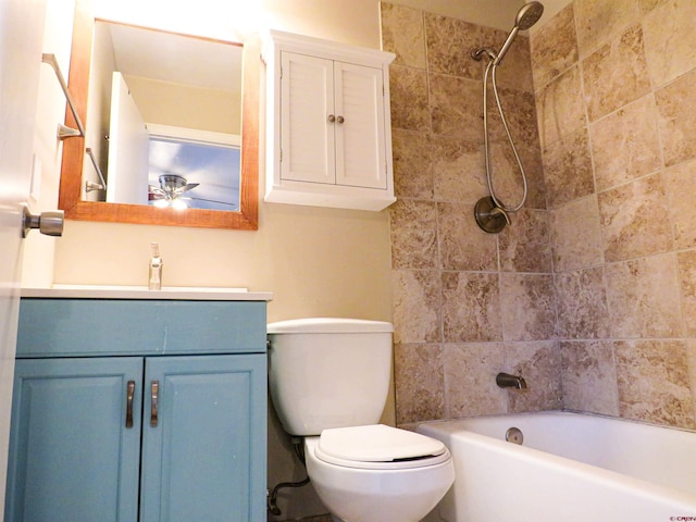 full bathroom featuring vanity, toilet, and tiled shower / bath combo