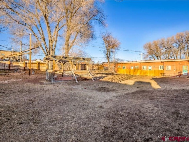 view of play area featuring fence