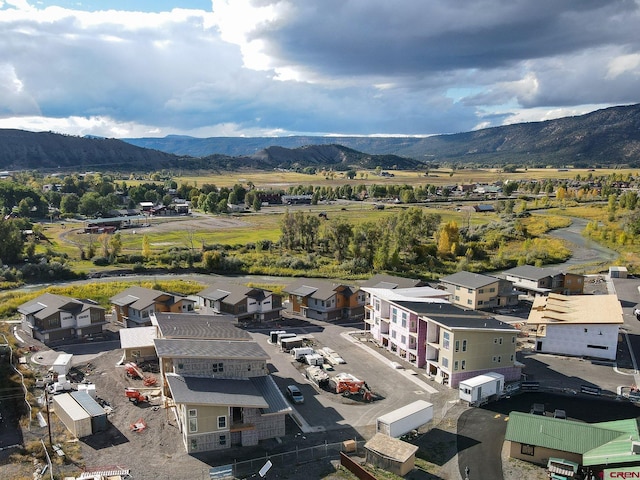 drone / aerial view featuring a mountain view