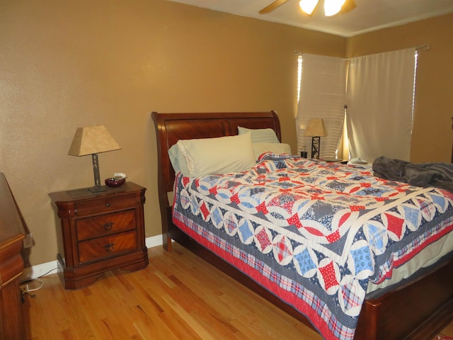 bedroom featuring ceiling fan and light wood-type flooring