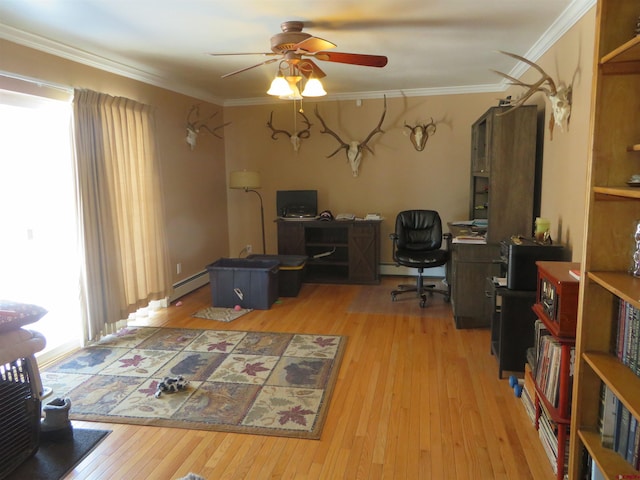 home office featuring ornamental molding, light hardwood / wood-style floors, ceiling fan, and baseboard heating