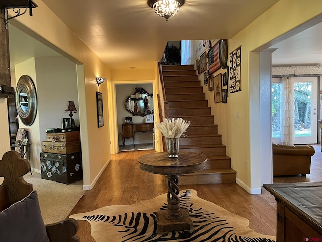 entrance foyer featuring hardwood / wood-style flooring