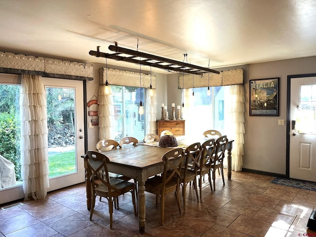 dining space with a wealth of natural light