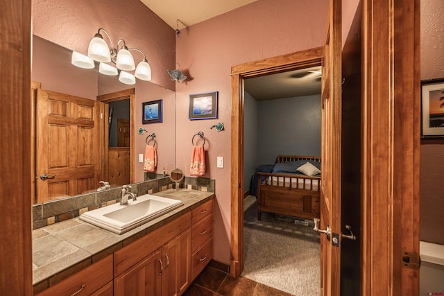 bathroom with vanity and tile patterned floors