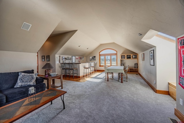 playroom featuring lofted ceiling and carpet floors