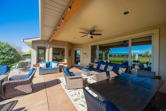 view of patio / terrace featuring outdoor lounge area and ceiling fan