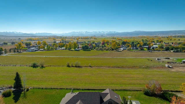 aerial view with a mountain view and a rural view