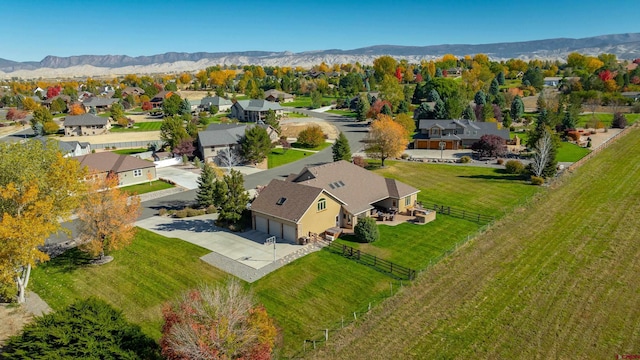 birds eye view of property featuring a mountain view