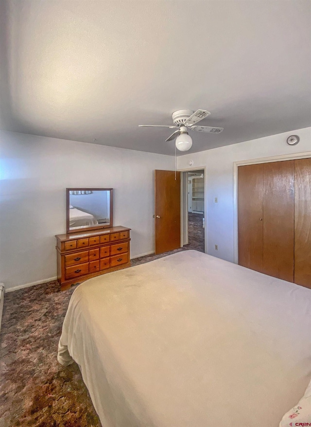 bedroom with a closet and ceiling fan