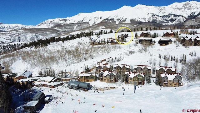 property view of mountains featuring a residential view