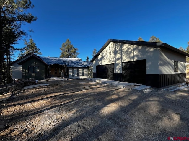 exterior space with a garage