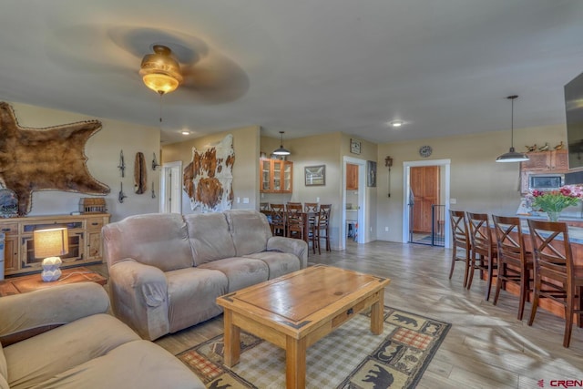 living room with light hardwood / wood-style floors