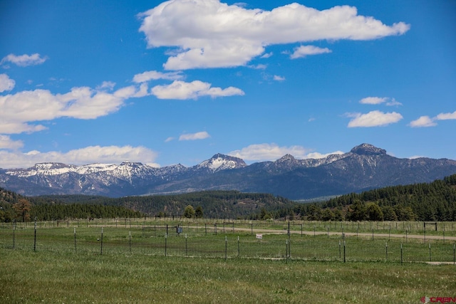 property view of mountains featuring a rural view