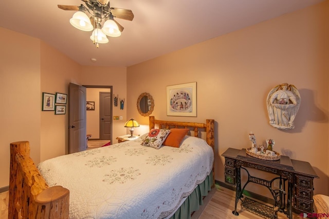 bedroom featuring light hardwood / wood-style flooring and ceiling fan