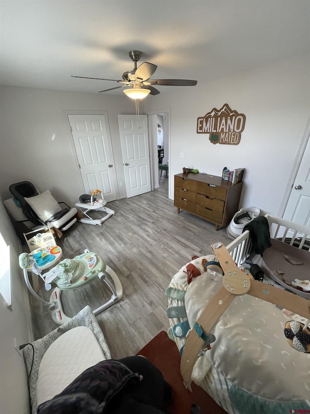 interior space with ceiling fan and light wood-type flooring