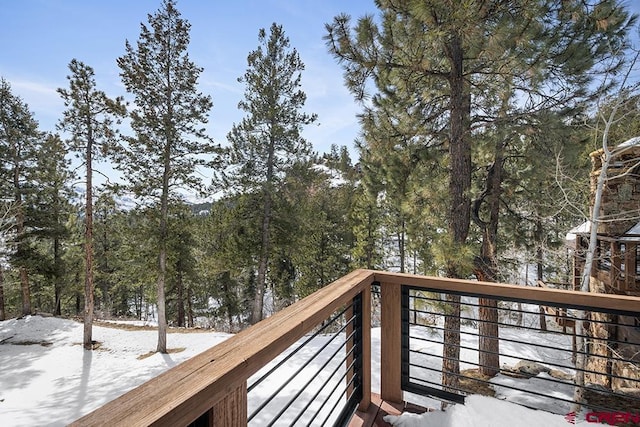 view of snow covered deck