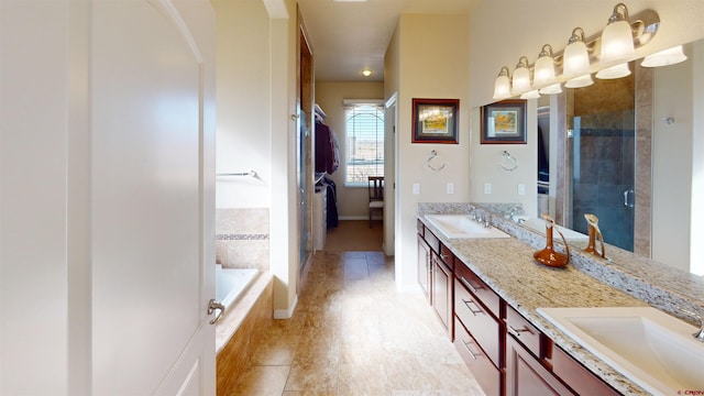 bathroom with vanity, separate shower and tub, and tile patterned floors