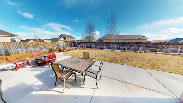 view of patio with an outdoor fire pit