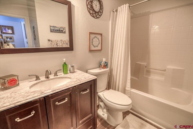 full bathroom with vanity, toilet, and shower / bath combo with shower curtain