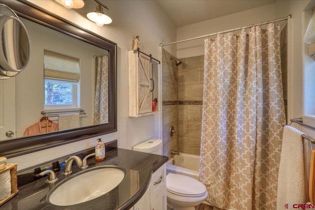 full bathroom featuring vanity, toilet, and shower / tub combo with curtain