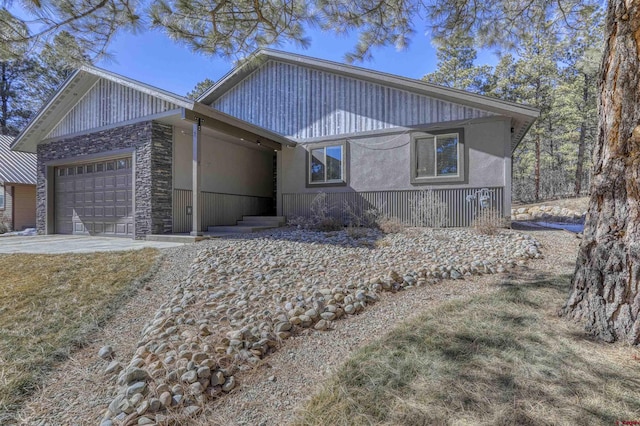 ranch-style house featuring a garage