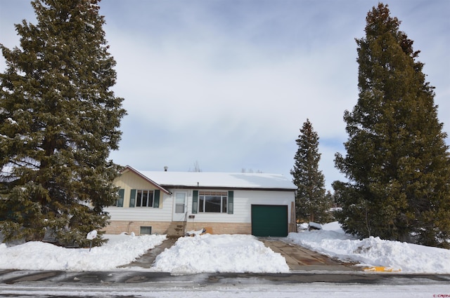 ranch-style home with a garage