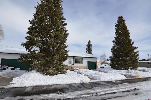 view of front of property featuring a garage