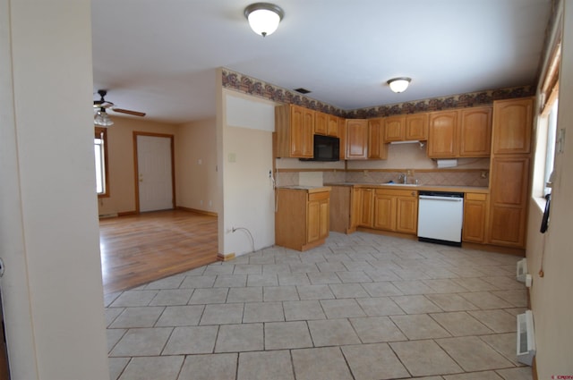 kitchen with sink, decorative backsplash, dishwasher, and ceiling fan