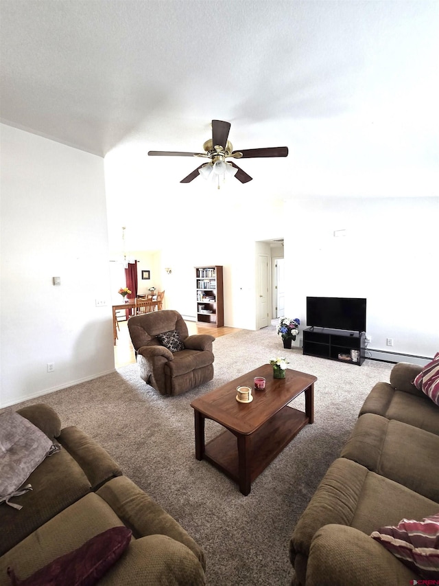 carpeted living area featuring ceiling fan, baseboard heating, and a textured ceiling