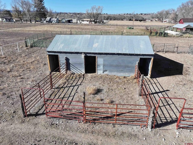 view of outdoor structure featuring a rural view