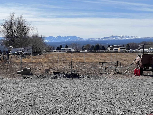 mountain view featuring a rural view