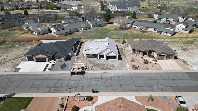 2319 Stone Bridge Dr, Montrose, CO 81401 - aerial overview of property's location with nearby suburban area