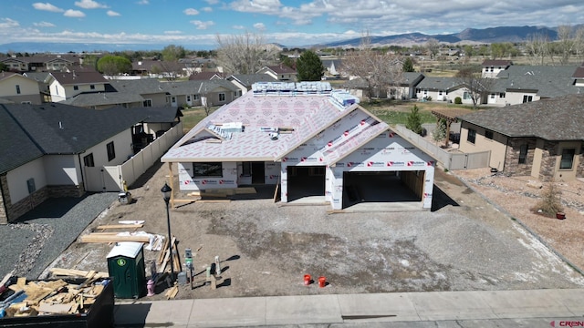 2319 Stone Bridge Dr, Montrose, CO 81401 - aerial perspective of suburban area with mountains