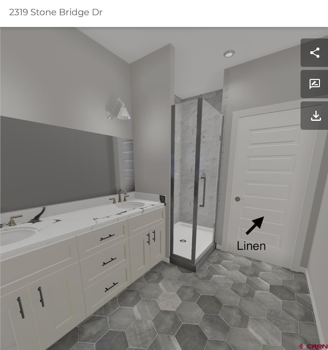 2319 Stone Bridge Dr, Montrose, CO 81401 - bathroom with a shower stall and double vanity