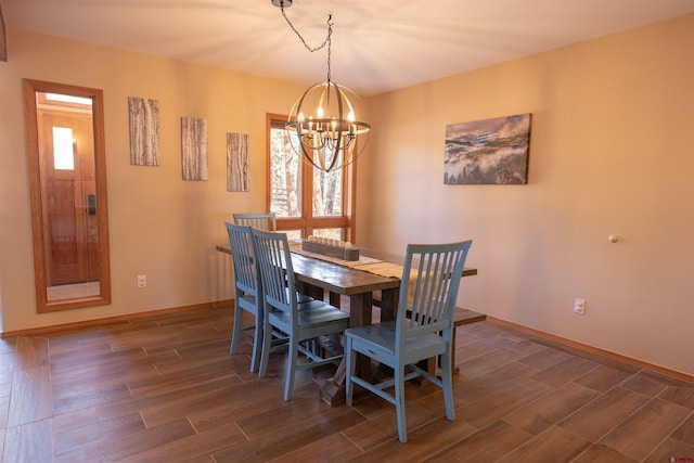 dining space featuring a chandelier