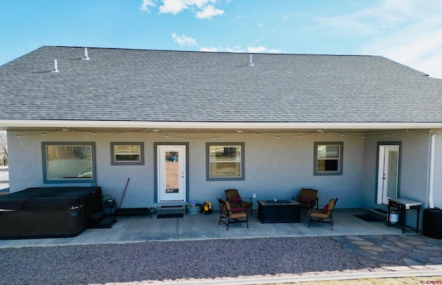 rear view of house featuring a patio