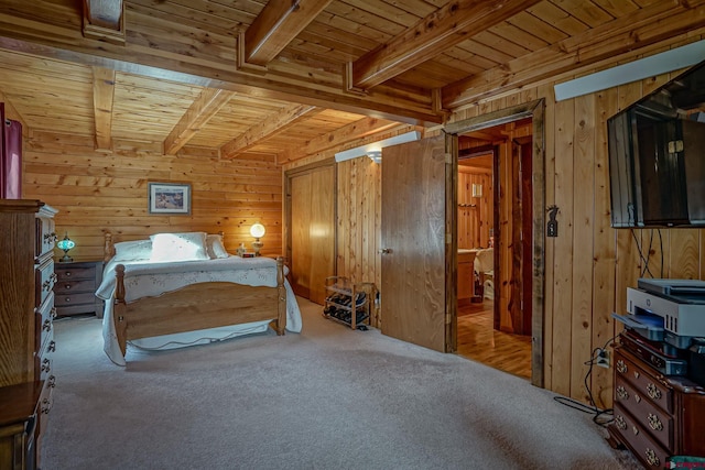 carpeted bedroom featuring wooden walls, wooden ceiling, and beam ceiling