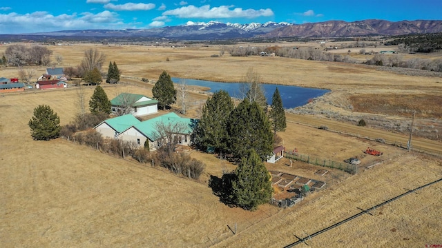 birds eye view of property featuring a rural view and a mountain view