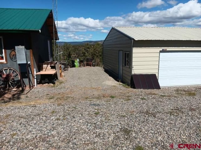 view of outdoor structure with a garage
