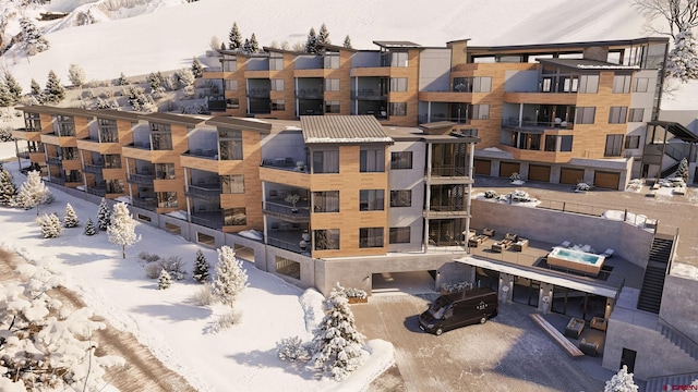 view of snow covered property