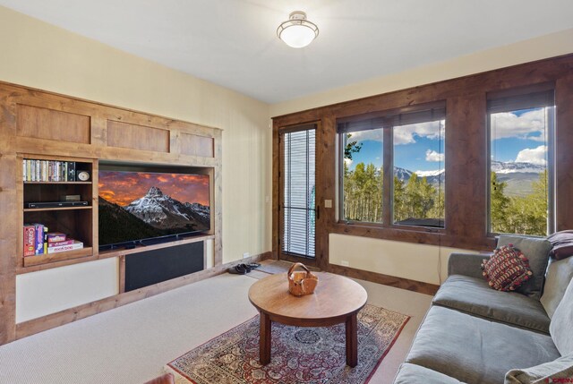 living room featuring baseboards